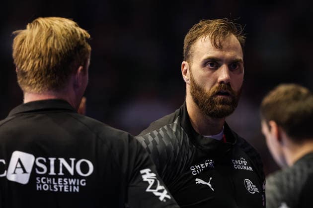 Goalkeeper Andreas Wolff of THW Kiel, 33, and Coach Borge Lund of THW Kiel; Handball Bundesliga Season 2026–2027: SC Magdeburg vs. THW Kiel at the GETEC Arena in Magdeburg; Handball, Germany, September 30, 2026