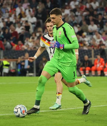 October 1, 2026, Nations League, Germany vs. Serbia, Allianz Arena, Munich, Soccer, Pictured: Djordje Pertovic of Serbia being marked by Florian Wirtz of Germany