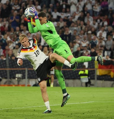 October 1, 2026, Nations League, Germany vs. Serbia, Allianz Arena, Munich, Soccer, Pictured: Jonathan Burkardt (Germany) vs. Djordje Pertovic (Serbia)