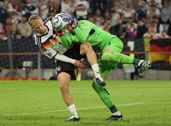 October 1, 2026, Nations League, Germany vs. Serbia, Allianz Arena, Munich, Soccer, Pictured: Jonathan Burkardt (Germany) vs. Djordje Pertovic (Serbia)