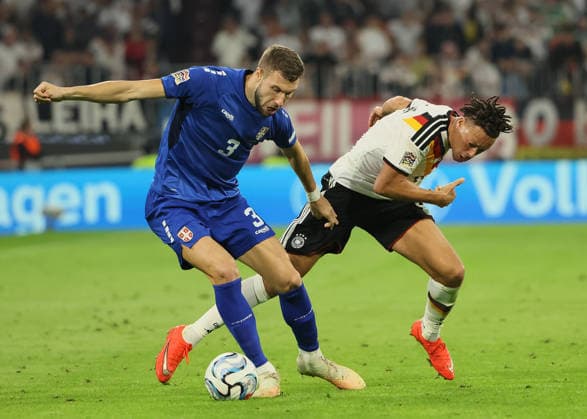 October 1, 2026, Nations League, Germany vs. Serbia, Allianz Arena, Munich, Soccer, Pictured: Strahinja Pavlovic (Serbia) vs. Derry Scherhant (Germany)