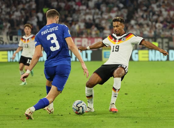 October 1, 2026, Nations League, Germany vs. Serbia, Allianz Arena, Munich, Soccer, Pictured: Strahinja Pavlovic (Serbia) vs. Bambase Conte (Germany)
