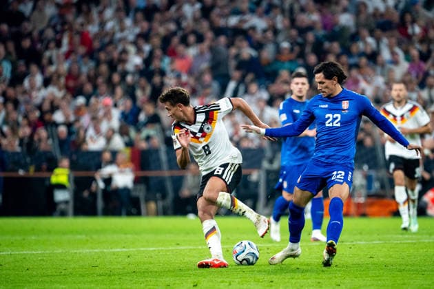 October 1, 2026, GER, Soccer, Men s, UEFA Nations League International Match, League A, Matchday 3, Germany vs. Serbia; Tom Bischof (Germany) in a 1-on-1 battle with Sasa Lukic (Serbia) at 8:00 a.m. at the Allianz Arena in Munich, Bavaria, Germany Copyright: xNordphoto Memmlerx