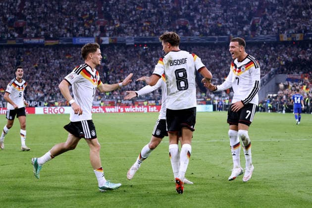 WIRTZ, Florian, of Team Germany, celebrates after scoring the goal that made the score 2–0, alongside BISCHOF, Tom. UEFA Nations League 2026–2027 season, Germany vs. Serbia, 2–0, October 1, 2026, Munich. DFL regulations prohibit any use of photographsRAPHS as IMAGE SEQUENCES and or QUASI-VIDEO Copyright: xLacixPerenyix