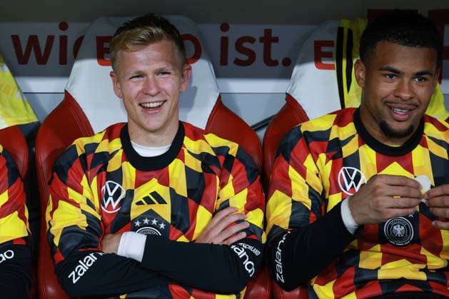 UEFA Nations League, Match 26-27: Germany vs. Serbia on October 1, 2026, at the Allianz Arena in Munich. Jonathan Jonny Burkardt (Germany, No. 10) and goalkeeper Noah Atubolu (Germany, No. 21) MH