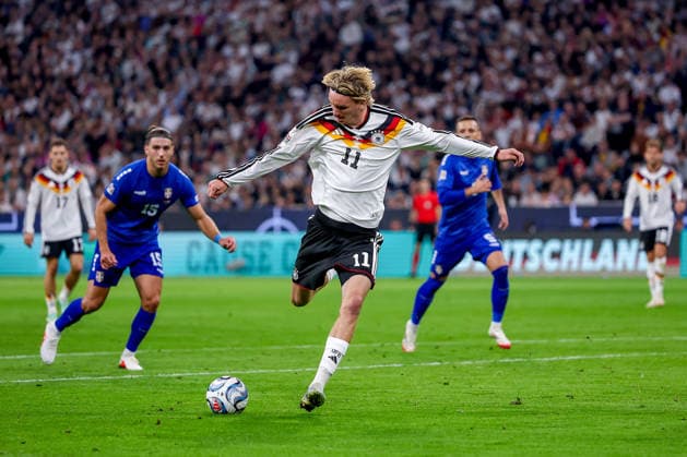 October 1, 2026, Soccer, International Match, Germany vs. Serbia, UEFA Nations League 2026–2027, Matchday 3, Allianz Arena, Munich, 2026–27 season, Nick Woltemade (GER) No. 11 taking a shot on goal. DFB regulations prohibit any use of photographs as image sequences and or quasi-video. Bayern Munich, Germany