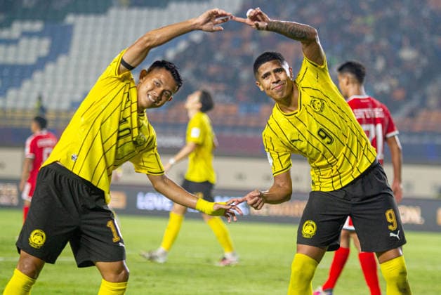 (261002) -- BANDUNG, Oct. 2, 2026 -- Arif Aiman (L) and Bergson of Malaysia celebrate after scoring during the FIFA ASEAN Cup 2026 Division 1 Group A match between Malaysia and Singapore at Si Jalak Harupat Stadium, in Bandung, West Java, Indonesia, Oct. 1, 2026. (Photo by Xinhua) (SP)INDONESIA-BANDUNG-FOOTBALL-FIFA ASEAN CUP 2026-DIVISION 1-GROUP A-MALAYSIA VS SINGAPORE SeptianjarxMuharam 
