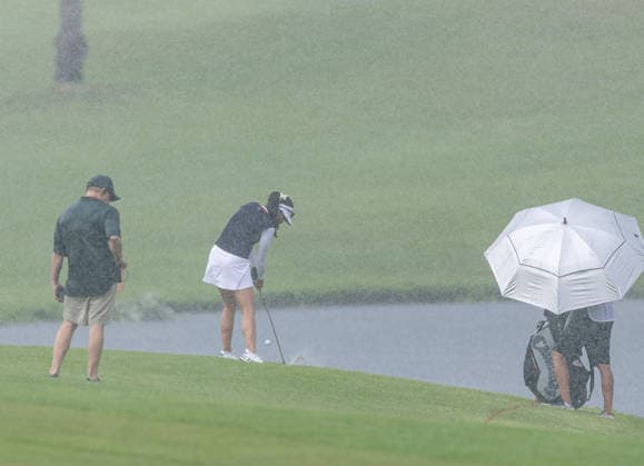 October 1, 2026, Honolulu, Hawaii, USA: BRITTANY FAN makes an approach shot on the 6th fairway in the rain at the 2026 Lotte Championship at Hoakalei Country Club, Ewa Beach, Hawaii, USA. Even though Hurricane Nolo had already passed Hawaii, its outer bands dropped bouts of heavy rain during Round 1. 2026 Lotte Championship Presented By Hoakalei - ZUMAm310 20261001_zsp_m310_021 Copyright: xElliotxMilesx