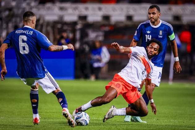 THESSALONIKI , 01-10-2026 , Toumba Stadium , season 2026 2027 , UEFA Nations League football , match between Greece and The Netherlands. picture shows Netherlands player Quinten Timber and Greece player Vangelis Pavlidis, Greece player Dimitris Kourbelis Greece - Netherlands  x207801739x Copyright: