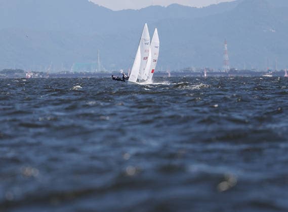 (261002) -- GAMAGORI, Oct. 2, 2026 -- Athletes compete during the Mixed Dinghy Opening Series Race of Sailing at the 20th Asian Games Aichi-Nagoya 2026 in Gamagori of Aichi Prefecture, Japan, Oct. 2, 2026. ) (SP)JAPAN-GAMAGORI-ASIAN GAMES-SAILING-MIXED DINGHY DengxHua