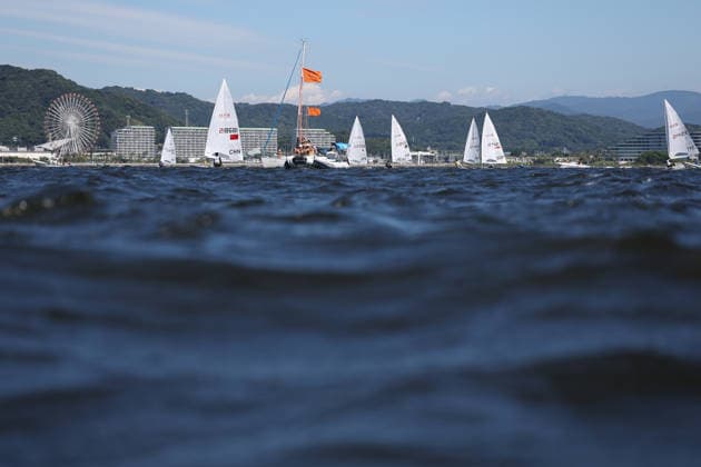 (261002) -- GAMAGORI, Oct. 2, 2026 -- Athletes compete during the Men s Dinghy Final of Sailing at the 20th Asian Games Aichi-Nagoya 2026 in Gamagori of Aichi Prefecture, Japan, Oct. 2, 2026. ) (SP)JAPAN-GAMAGORI-ASIAN GAMES-SAILING-MEN S DINGHY DengxHua