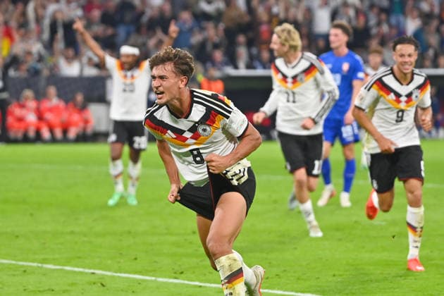 Goal celebration: Tom BISCHOF (GER) after scoring the 1-0 goal, Celebration, Joy, Excitement, Action, Single Frame, Cropped Single Subject, Half-Figure, Half-Figure Soccer Nations League Group Stage, Group B, Matchday 3 Germany (GER) vs. Serbia (SRB) 2–0 on October 1, 2026, ALLIANZ ARENA