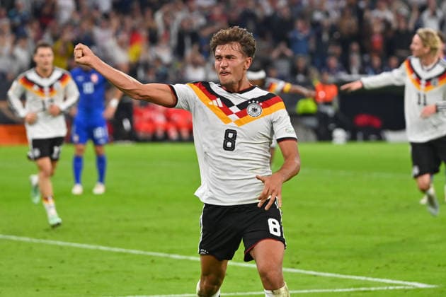 Goal celebration: Tom BISCHOF (GER) after scoring the 1-0 goal, Celebration, Joy, Excitement, Action, Single Frame, Cropped Single Subject, Half-Figure, Half-Figure Soccer Nations League Group Stage, Group B, Matchday 3 Germany (GER) vs. Serbia (SRB) 2–0 on October 1, 2026, ALLIANZ ARENA