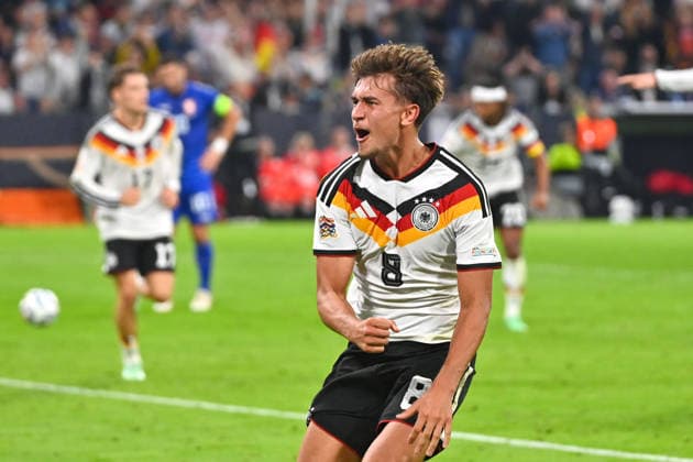 Goal celebration: Tom BISCHOF (GER) after scoring the 1-0 goal, Celebration, Joy, Excitement, Action, Single Frame, Cropped Shot, Half-Figure, Half-Body Shot, UEFA Nations League Group Stage, Group B, Matchday 3: Germany (GER) vs. Serbia (SRB) 2–0 on October 1, 2026, Allianz Arena