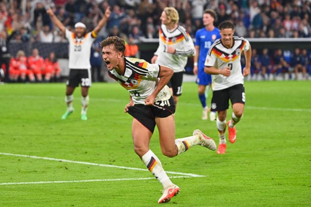 Tom BISCHOF (GER) celebrating after scoring the 1-0 goal; celebration, joy, excitement, action, individual play, single frame, cutout, full-body shot, full-figure shot; UEFA Nations League group stage, Group B, Matchday 3: Germany (GER) vs. Serbia (SRB) 2–0 on October 1, 2026, Allianz Arena