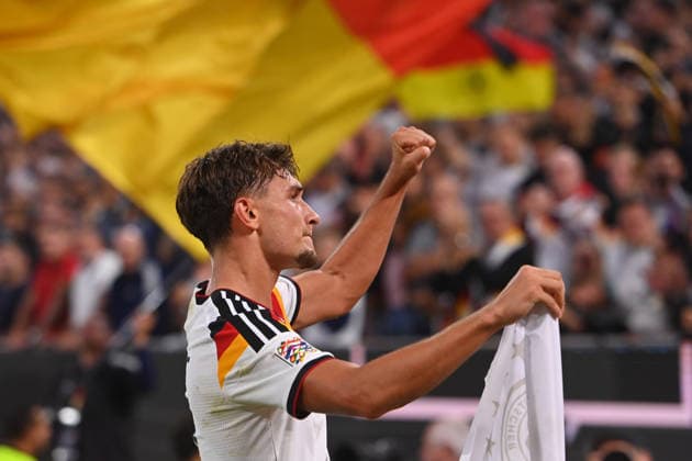 Goal celebration: Tom BISCHOF (GER) after scoring the 1-0 goal, Celebration, Joy, Excitement, Action, Single Frame, Cropped Single Shot, Half-Figure, Half-Figure Soccer Nations League Group Stage, Group B, Matchday 3: Germany (GER) vs. Serbia (SRB) 2–0 on October 1, 2026, ALLIANZ ARENA