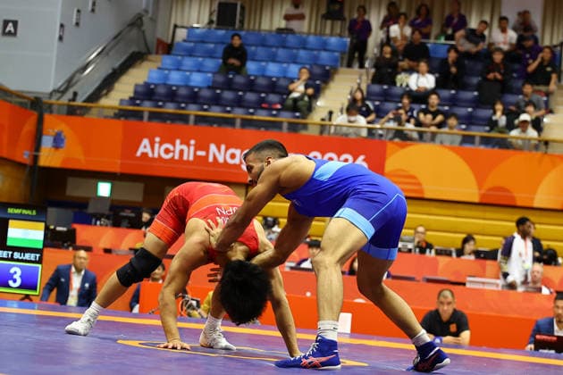 Asian Games 2026 Aichi-Nagoya, Japan Wrestling MFS 65 Kg Semifinals India™s Sujeet Vs Japan™s Olympic Gold Medalist KIYOOKA Katora Sujeet won by 3-3 and entered finals. VPOI 3-1 with points - with Point (s) scored by the opponent. Aichi, Nagoya Japan Copyright: xSeshadrixSukumarx