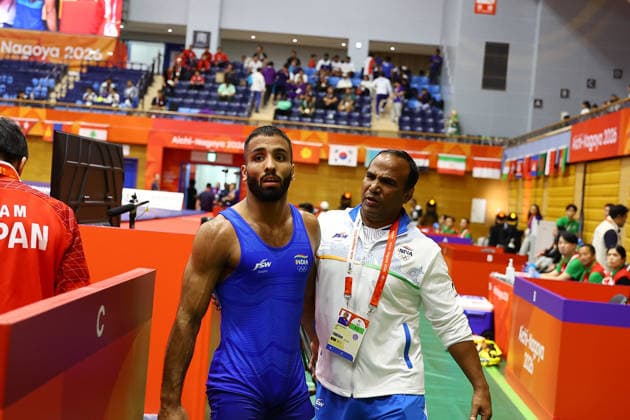 Asian Games 2026 Aichi-Nagoya, Japan Wrestling MFS 65 Kg Semifinals India™s Sujeet Vs Japan™s Olympic Gold Medalist KIYOOKA Katora Sujeet won by 3-3 and entered finals. VPOI 3-1 with points - with Point (s) scored by the opponent. Aichi, Nagoya Japan Copyright: xSeshadrixSukumarx