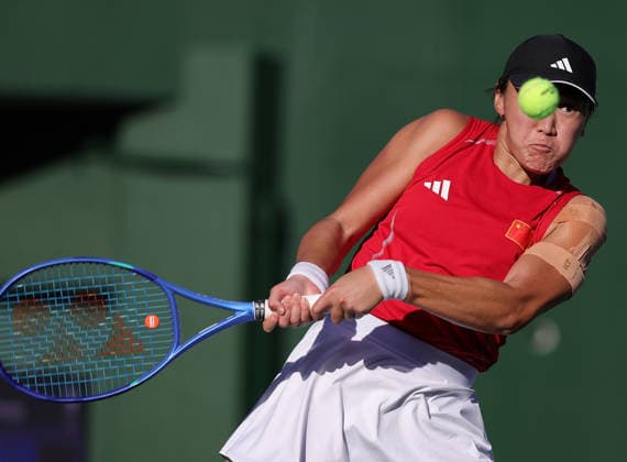 (261002) -- NAGOYA, Oct. 2, 2026 -- Wang Xiyu hits a return during the women s singles Gold Medal Match of tennis between Wang Xiyu of China and Zhang Shuai of China at the 20th Asian Games Aichi-Nagoya 2026 in Nagoya, Japan, Oct. 2, 2026. ) (SP)JAPAN-NAGOYA-ASIAN GAMES-TENNIS-WOMEN S SINGLES-GOLD MEDAL MATCH LixBo 