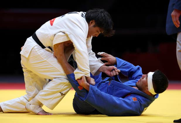 (261002) -- NAGOYA, Oct. 2, 2026 -- Okada Riku (L) of Japan vies with Erlan Sherov of Kyrgyzstan during the men -90kg final of Judo at the 20th Asian Games Aichi-Nagoya 2026 in Nagoya, Japan, Oct. 2, 2026. ) (SP)JAPAN-NAGOYA-ASIAN GAMES-JUDO-MEN -90KG YaoxQilin