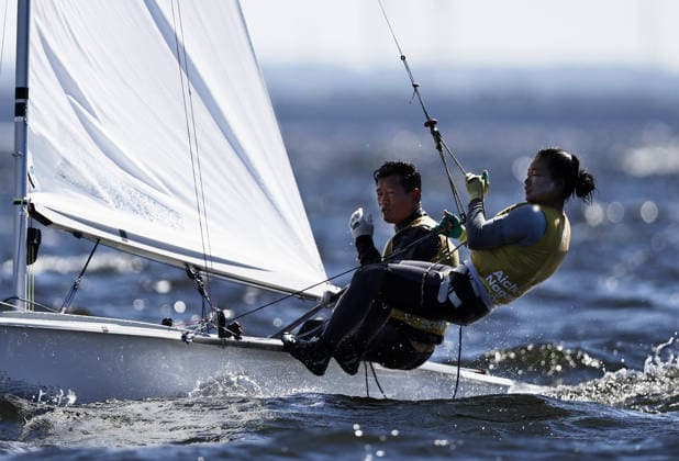 Aichi-Nagoya Asian Games: Sailing Japanese sailors Yurie Seki (R) and Tetsuya Isozaki compete en route to winning the Aichi-Nagoya Asian Games mixed dinghy gold off Kaiyoh Yacht Harbor in Gamagori in Aichi Prefecture, central Japan, on Oct. 2, 2026. A14AA0005629732P