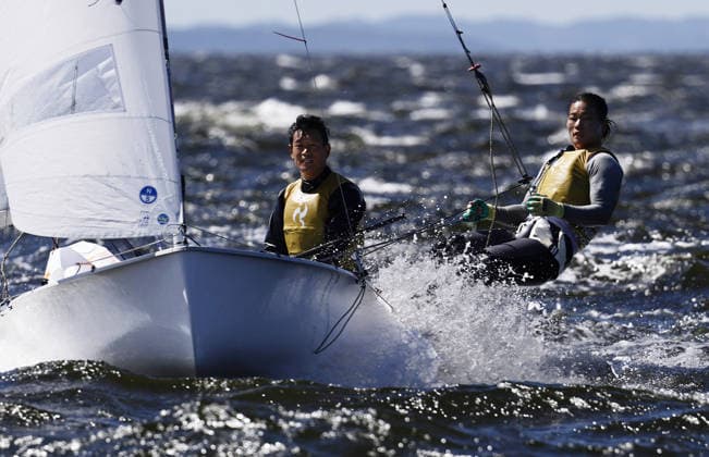 Aichi-Nagoya Asian Games: Sailing Japanese sailors Yurie Seki (R) and Tetsuya Isozaki compete en route to winning the Aichi-Nagoya Asian Games mixed dinghy gold off Kaiyoh Yacht Harbor in Gamagori in Aichi Prefecture, central Japan, on Oct. 2, 2026. A14AA0005629733P