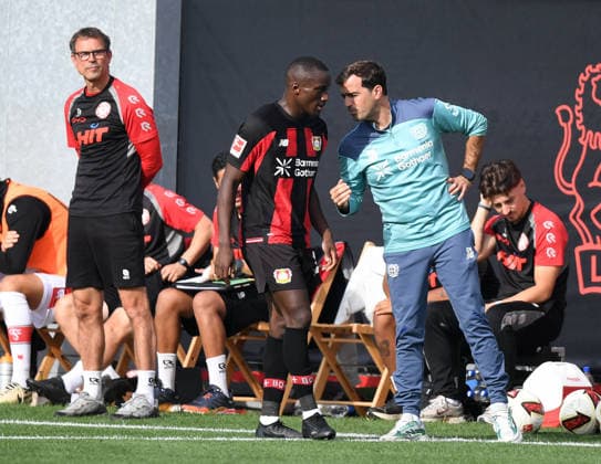 October 2, 2026, xophax, Soccer, Bundesliga 1, Bayer 04 Leverkusen vs. Fortuna Cologne (friendly match); from left to right: Coach Matthias Mink (SC Fortuna Cologne), Moussa Diaby (BAYER 04), and Coach Carles Martinez (Bayer 04 Leverkusen)