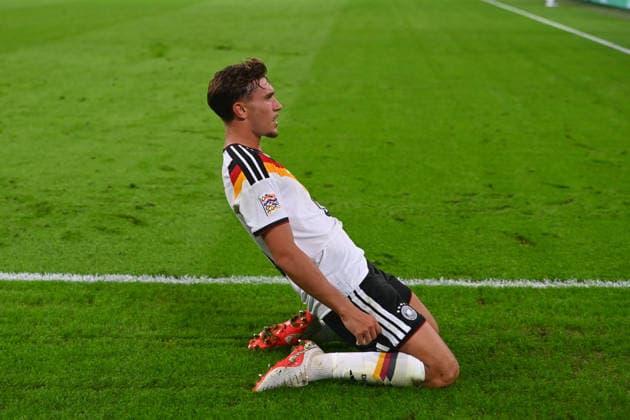 Goal celebration: Tom BISCHOF (GER) after scoring the 1-0 goal—celebration, joy, excitement, action, individual play, single frame, cutout, full-body shot, full figure. UEFA Nations League group stage, Group B, Matchday 3: Germany (GER) vs. Serbia (SRB) 2–0 on October 1, 2026, Allianz Arena