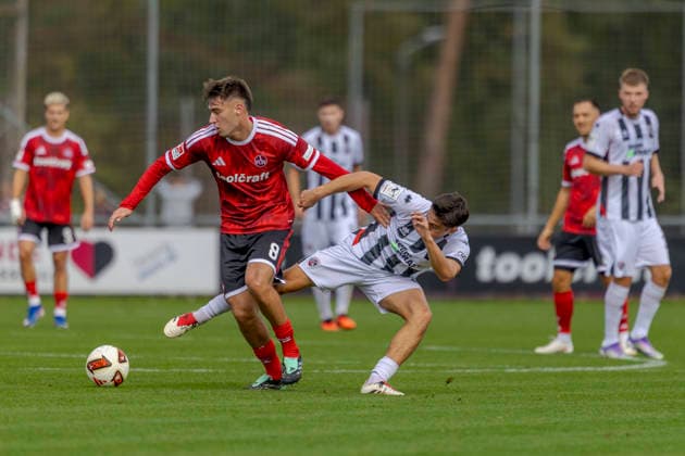 Nuremberg, Germany, October 2, 2026; Friendly Match 2026–2027: 1. FC Nürnberg vs. FC Ingolstadt 04. Pictured, from left, in a tackle: Javier Fernandez (FCN) and Emre Gül Guel (FCI). Sportpark Valznerweiher, Bavaria. Copyright: xFotostandx xSchäferx