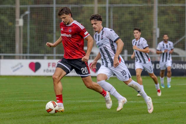 Nuremberg, Germany, October 2, 2026; Friendly Match 2026–2027: 1. FC Nuremberg vs. FC Ingolstadt 04. Pictured, from left, in a tackle: Fynn Otto (FCN) and Dennis Kaygin (FCI). Sportpark Valznerweiher, Bavaria Copyright: xFotostandx xSchäferx