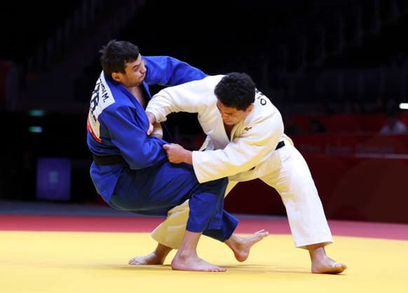 (261002) -- NAGOYA, Oct. 2, 2026 -- Ota Hyoga (R) of Japan vies with Muzaffarbek Turoboyev of Uzbekistan during the men +100kg final of Judo at the 20th Asian Games Aichi-Nagoya 2026 in Nagoya, Japan, Oct. 2, 2026. ) (SP)JAPAN-NAGOYA-ASIAN GAMES-JUDO-MEN +100KG YaoxQilin