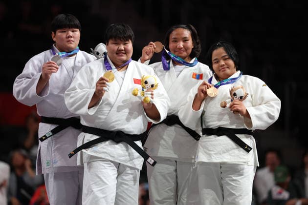 (261002) -- NAGOYA, Oct. 2, 2026 -- Gold medalist Niu Xinran (2nd L) of China, poses with silver medalist Lee Hyeonji (1st L) of South Korea and bronze medalists Amarsaikhan Adiyasuren (2nd R) of Mongolia and Mukunoki Miki of Japan during the awarding ceremony for the women +78kg final of Judo at the 20th Asian Games Aichi-Nagoya 2026 in Nagoya, Japan, Oct. 2, 2026. ) (SP)JAPAN-NAGOYA-ASIAN GAMES-JUDO-WOMEN +78KG YaoxQilin 