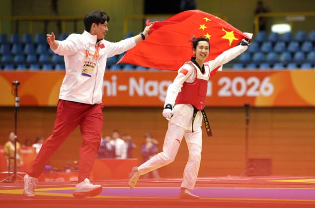 (261002) -- TOYOHASHI, Oct. 2, 2026 -- Ma Jingyue (R) of China celebrates victory after the women -49kg final of taekwondo at the 20th Asian Games Aichi-Nagoya 2026 in Toyohashi of Aichi Prefecture, Japan, Oct. 2, 2026. ) (SP)JAPAN-TOYOHASHI-ASIAN GAMES-TAEKWONDO-WOMEN -49KG WangxFei 