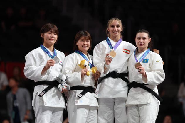 (261002) -- NAGOYA, Oct. 2, 2026 -- Gold medalist Sugimura Mizuki (2nd L) of Japan, silver medalist Kim Minju (1st L) of South Korea, bronze medalists Aqulina Chayeb of Lebanon (2nd R) and Ekaterina Tokareva of Kazakhstan pose during the awarding ceremony for the women s -78kg of Judo at the 20th Asian Games Aichi-Nagoya 2026 in Nagoya, Japan, Oct. 2, 2026. ) (SP)JAPAN-NAGOYA-ASIAN GAMES-JUDO-WOMEN-78KG YaoxQilin 