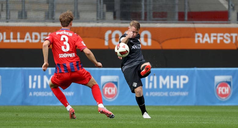 October 2, 2026, xfsx, Men s, Soccer, 2026–2027 Season, Friendly Match: 1. FC Heidenheim 1846 vs. FC Würzburger Kickers; from left: Jan Schoeppner (1. FC Heidenheim 1846), Mikkel Kaufmann, 1. FC Heidenheim 1846, Paul Hennrich, 1. FC Heidenheim 1846, celebrating the goal, goal celebration, celebrating the 1–0 goal for Heidenheim an der Brenz at the Voith Arena in Baden-Württemberg, Germany