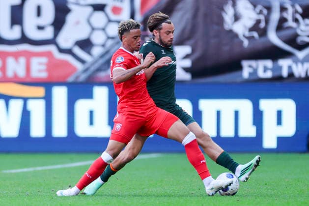 Max Bruns of FC Twente Enschede and Michal Rosiak of FC Twente Enschede battle for the ball during the friendly match between FC Twente Enschede and Werder Bremen at De Grolsch Veste on October 2, 2026, in Enschede, Netherlands Photo by Marco Steinbrenner DeFodi Images Max Bruns of FC Twente Enschede and Michal Rosiak of FC Twente Enschede battle for the ball during the friendly match between FC Twente Enschede and Werder Bremen at De Grolsch Veste on October 2, 2026, in Enschede, Netherlands. Photo by Marco Steinbrenner, DeFodi Images. Photo by Marco Steinbrenner, DeFodi Images.