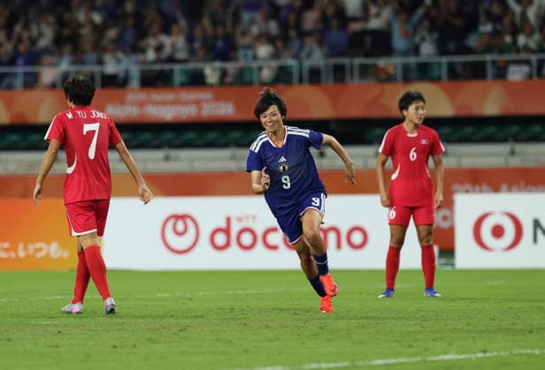 (261002) -- FUKUROI, Oct. 2, 2026 -- Ueno Mami (C) of Japan celebrates scoring during the women s final match of football between Japan and the Democratic People s Republic of Korea (DPRK) at 20th Asian Games Aichi-Nagoya 2026 in Fukuroi of Shizuoka Prefecture, Japan, Oct. 2, 2026. ) (SP)JAPAN-FUKUROI-ASIAN GAMES-FOOTBALL-WOMEN FINAL-PRK VS JPN JiaxHaocheng 