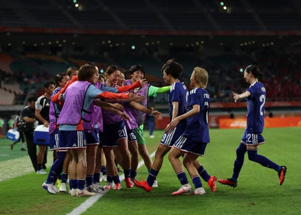 (261002) -- FUKUROI, Oct. 2, 2026 -- Players of Japan celebrate scoring during the women s final match of football between Japan and the Democratic People s Republic of Korea (DPRK) at 20th Asian Games Aichi-Nagoya 2026 in Fukuroi of Shizuoka Prefecture, Japan, Oct. 2, 2026. ) (SP)JAPAN-FUKUROI-ASIAN GAMES-FOOTBALL-WOMEN FINAL-PRK VS JPN JiaxHaocheng 
