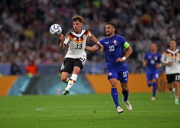 Germany vs. Serbia, Soccer, Men s, 2026–2027 Season, International Match, Nations League, Matchday 3, League A, Group 2, Allianz Arena: Philipp Treu (Germany, left) and Dusan Tadic (Serbia, right) battle for the ball