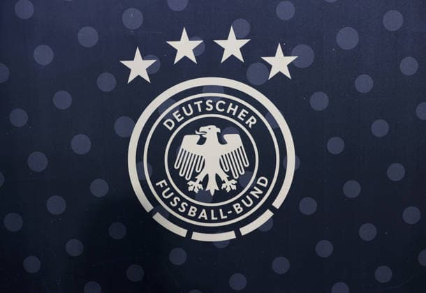Germany vs. Serbia, Soccer, Men s, 2026–2027 Season, International Match, Nations League, Matchday 3, League A, Group 2, Allianz Arena; Here is the logo and crest of the DFB (German Soccer Association) on a banner; stock photo