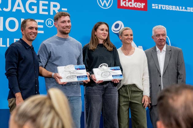 Philipp Lahm, soccer player and 2014 World Cup champion, and Alexandra Popp, soccer player and Olympic champion, with Eike Tjark Schmidt of GVO Oldenburg (54 goals in League 7) and Larissa Krumrey of SV Lohausen, 81 goals in League 7, at the ceremony honoring the top goal scorers in German amateur soccer in the Volkswagen VW Media Lounge, with the theme Top Scorer Award for Everyone —GER, Germany vs. Serbia, soccer, UEFA Nations League, League A group stage, Matchday 3, 2026–2027 season, October 1, 2026. DFL and DFB regulations prohibit any use of photographs as image sequences and or quasi-video. Photo: HMB Media, Heike Feiner Copyright: HMBxMedia HeikexFeiner