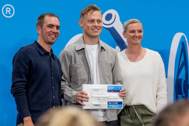Philipp Lahm, soccer player and 2014 World Cup champion, and Alexandra Popp, soccer player and Olympic champion, with Jonas Telschow of Kirchhoerder SC 58, 71 goals in League 8 at the ceremony honoring the top goal scorers in German amateur soccer at the Volkswagen VW Media Lounge, themed Top Scorer Award for Everyone, GER, Germany vs. Serbia, soccer, UEFA Nations League, League A group stage, Matchday 3, 2026–2027 season, October 1, 2026. DFL and DFB regulations prohibit any use of photographs as image sequences and or quasi-video. Photo: HMB Media, Heike Feiner Copyright: HMBxMedia HeikexFeiner