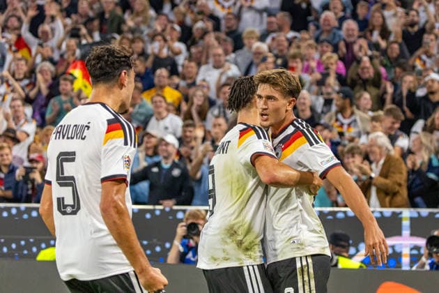 October 1, 2026 Germany vs. Serbia, Munich, October 1, 2026, Soccer, Nations League, 2026–2027 season, Germany vs. Serbia; Aleksandar Pavlovic, Derry Scherhant, Tom Bischof (all Germany); celebration after goal 1–0 by Bischof