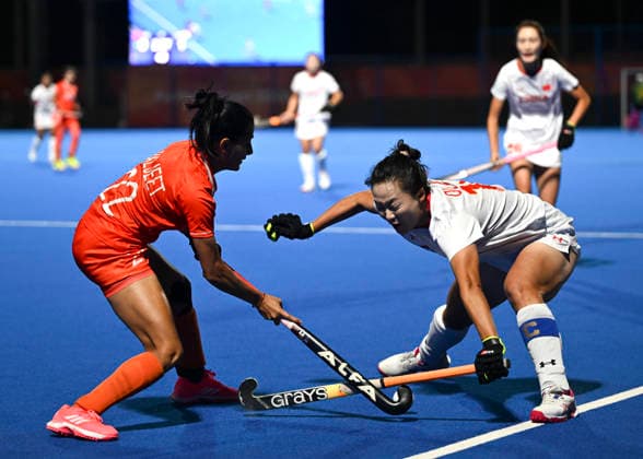 (261002) -- GIFU, Oct. 2, 2026 -- Ou Zixia (front R) of China competes with Bajeet Kaur of India during the women hockey final match between China and India at 20th Asian Games Aichi-Nagoya 2026 in Gifu, Japan, Oct. 2, 2026. ) (SP)JAPAN-GIFU-ASIAN GAMES-HOCKEY-WOMEN-FINAL LiuxLei 