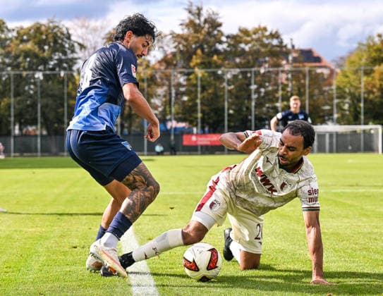 October 2, 2026, GER, Soccer, Men s, FSP, FC Augsburg vs. Hertha BSC Berlin Kevin Sessa (Hertha BSC), 8, Alexis Claude Maurice (FC Augsburg), 20 Augsburg Paul Renz Academy Bavaria Germany Copyright: xNordphotox xHafnerx
