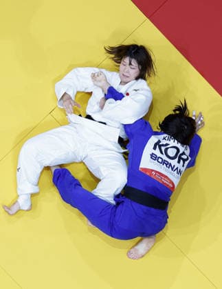 Aichi-Nagoya Asian Games: Judo Japan s Mizuki Sugimura (white) competes en route to beating Kim Min Ju of South Korea in the Aichi-Nagoya Asian Games women s judo 78-kilogram final at Aichi International Arena in Nagoya, central Japan, on Oct. 2, 2026. A14AA0005629769P