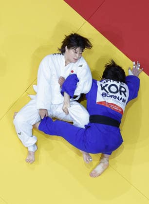 Aichi-Nagoya Asian Games: Judo Japan s Mizuki Sugimura (white) competes en route to beating Kim Min Ju of South Korea in the Aichi-Nagoya Asian Games women s judo 78-kilogram final at Aichi International Arena in Nagoya, central Japan, on Oct. 2, 2026. A14AA0005629770P