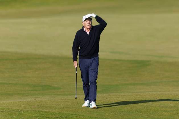 RECORD DATE NOT STATED 2nd October 2026; Kingsbarns Golf Links, St Andrews, Scotland; DP World Tour Golf, Alfred Dunhill Links Championship, Day 2; Demott Desmond, the largest individual shareholder in Celtic FC walks down the fourth hole DavidxYoung