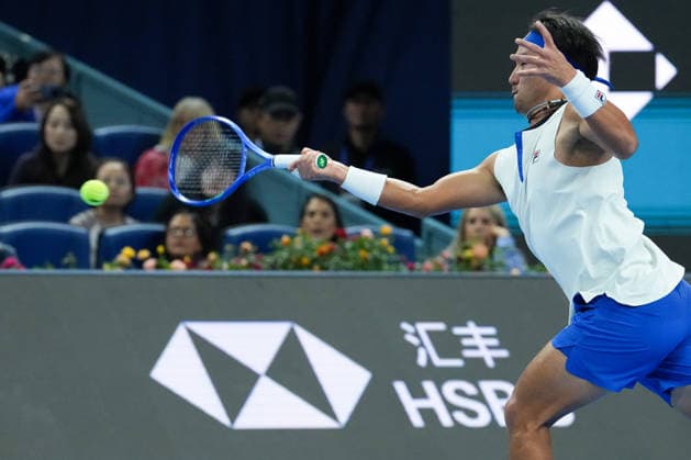 (261002) -- BEIJING, Oct. 2, 2026 -- Bu Yunchaokete of China hits a return during the men s singles second round match between Bu Yunchaokete of China and Novak Djokovic of Serbia at 2026 China Open tennis tournament in Beijing, China, Oct. 2, 2026. ) (SP)CHINA-BEIJING-TENNIS-CHINA OPEN-MEN S SINGLES(CN) JuxHuanzong 