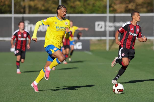 Eintracht Frankfurt vs. Eintracht Braunschweig, Friendly Match: Sidi Sane (Braunschweig, No. 24) in a footrace with Timothy Chandler (Eintracht Frankfurt), 22 Friendly match between Eintracht Frankfurt and Eintracht Braunschweig on October 2, 2026, at Deutsche Bank Park in Frankfurt am Main, Frankfurt am Main, Hesse, Germany, Deutsche Bank Park